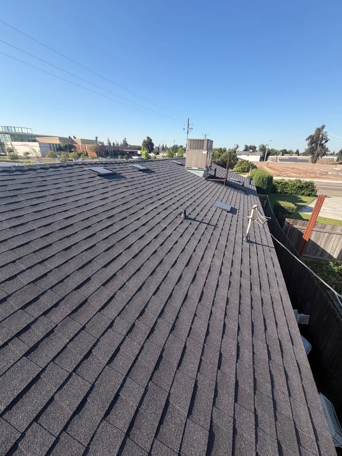 Full Roof Replacement with Re-Decking – Owens Corning Night Sky in Fowler, CA by New View Roofing – Photo 3