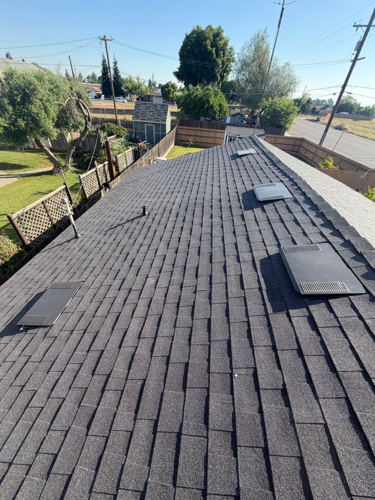 Full Roof Replacement with Re-Decking – Owens Corning Night Sky in Fowler, CA by New View Roofing – Photo 4