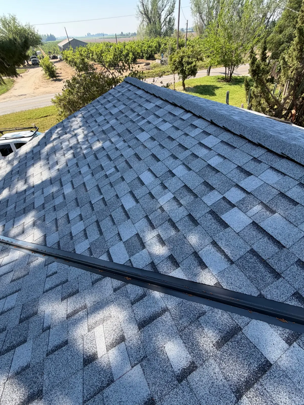 Complete Roof Replacement with Valley & Ridge Detail – Owens Corning Sierra Gray in Fresno, CA by New View Roofing – Photo 3