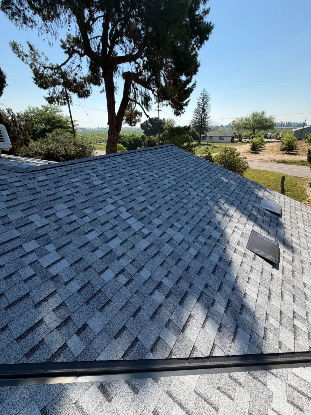 Complete Roof Replacement with Valley & Ridge Detail – Owens Corning Sierra Gray in Fresno, CA by New View Roofing – Photo 4