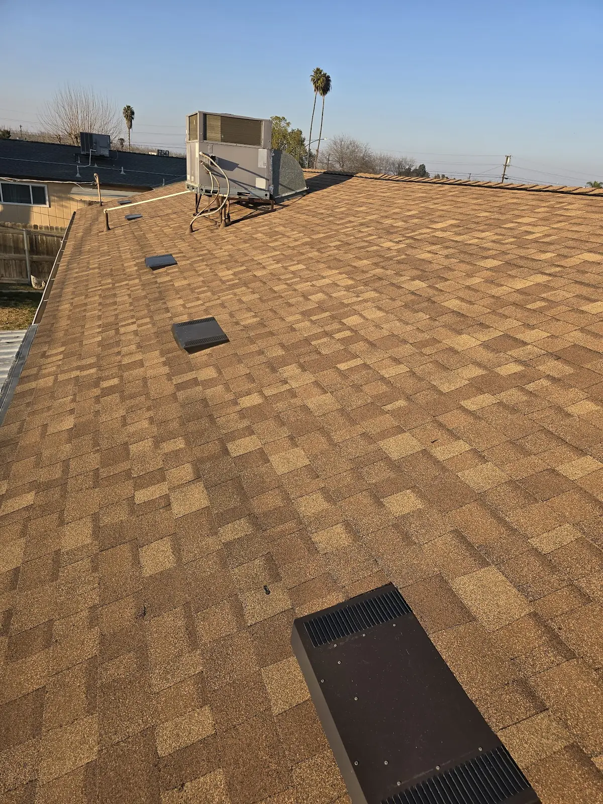 Two-Tone Reroof with Chimney Flashing & Spark Arrestor – Owens Corning Teak in Visalia, CA by New View Roofing – Photo 2